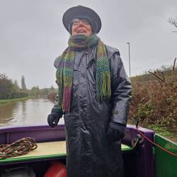 A very soggy Will at the tiller