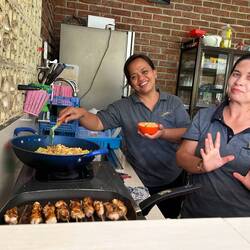 Nopi & Sinta at cooking