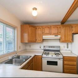 The kitchen was outdated and cabinets were falling apart inside. Range was unusable.