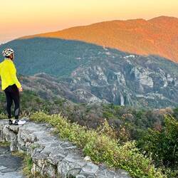 Japanese cyclist enjoying the view of Kankakei valley