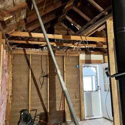 This is looking at one half of the kitchen. The door, goes out to the patio and the garage.