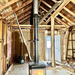 The gas stove will be move to the garage in favor of a gas fireplace in the living room.