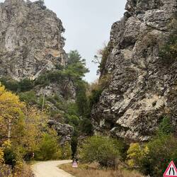 The road weaves its way through the barriers