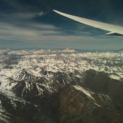 Slept a bit, forgot I was flying during the day, looked out, and there were LOTS of mountains.