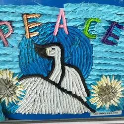 A picture entirely made from cranes by one of the local schools in Hiroshima