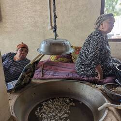 Ladies hard at work hand weaving the silk