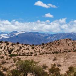 Glaciers in the distance - quite unexpected when you're melting while riding through the 35 C sun