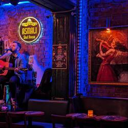 My nocturnal wanderings led me to a Turkish Folk singer in a smoky room - not sure which was worse