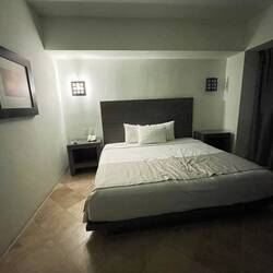 My big kingsize bed in the We Aeropuerto Hotel