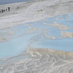 Up close they were made of still blue chalky water that promises to cure all that ails ya.