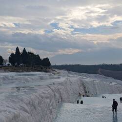 The terraces were on the edge of a cliff and were made of dozens of tiered pools.