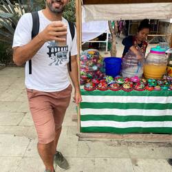 Me kn front of a stand selling the typical drink "Tejate"