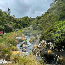 Descent to lower lakes and thermal springs.