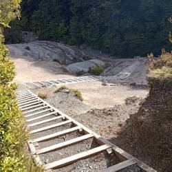 stairs out of nowhere down a steep slope