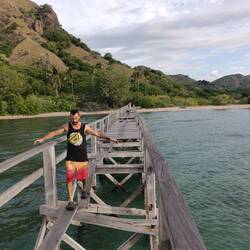 Climbing a broken pier at Pandar island, to reach the beach 😅