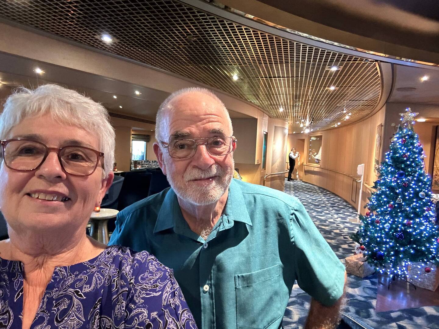 Us going to dinner near another Christmas Tree