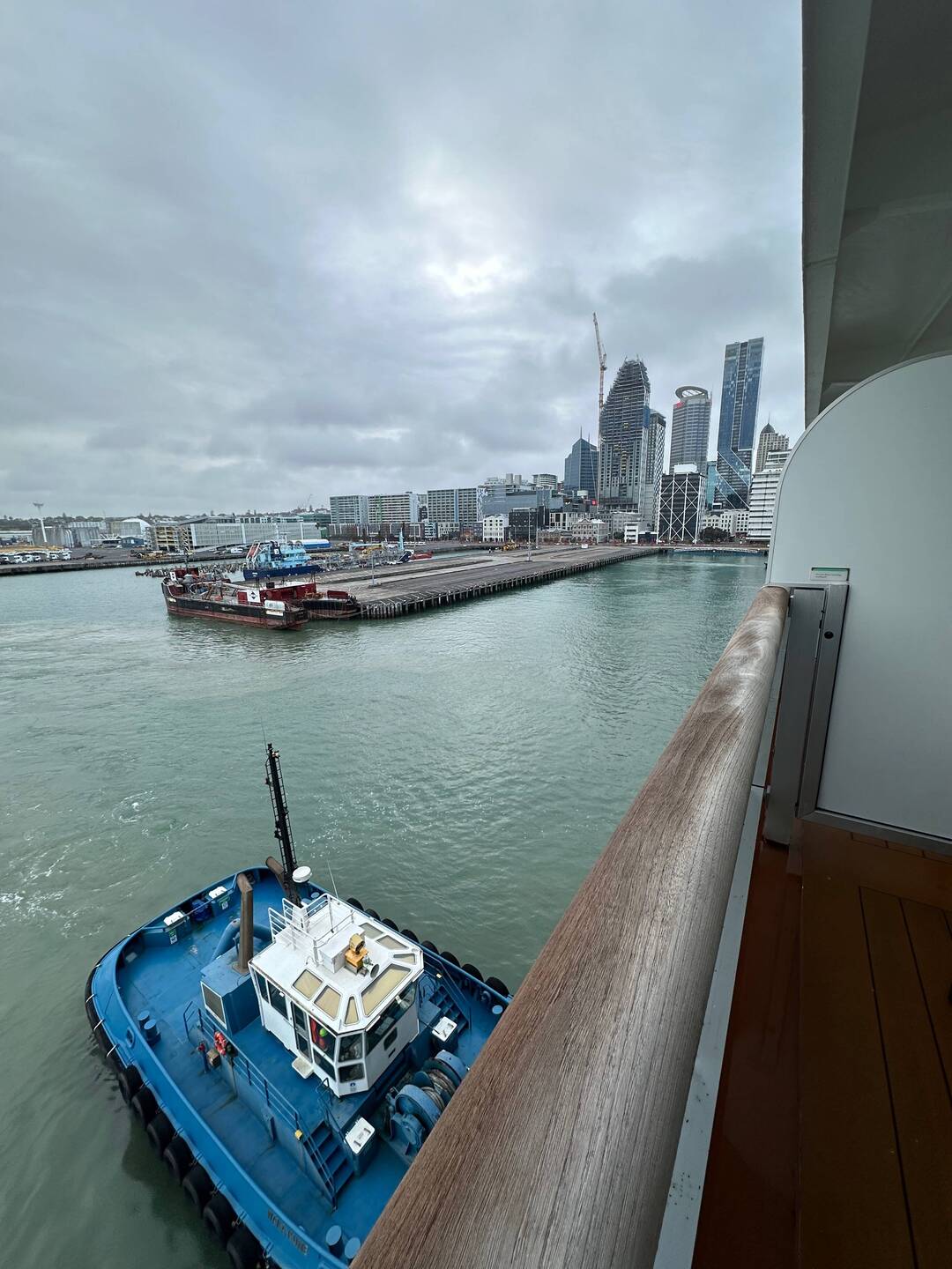 Tugs pushing us into dock.