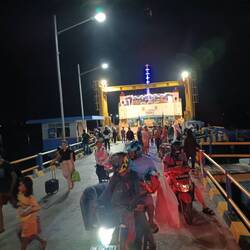 Ferry debarking at Kupang at 5am. Too late to catch some sleep, so...