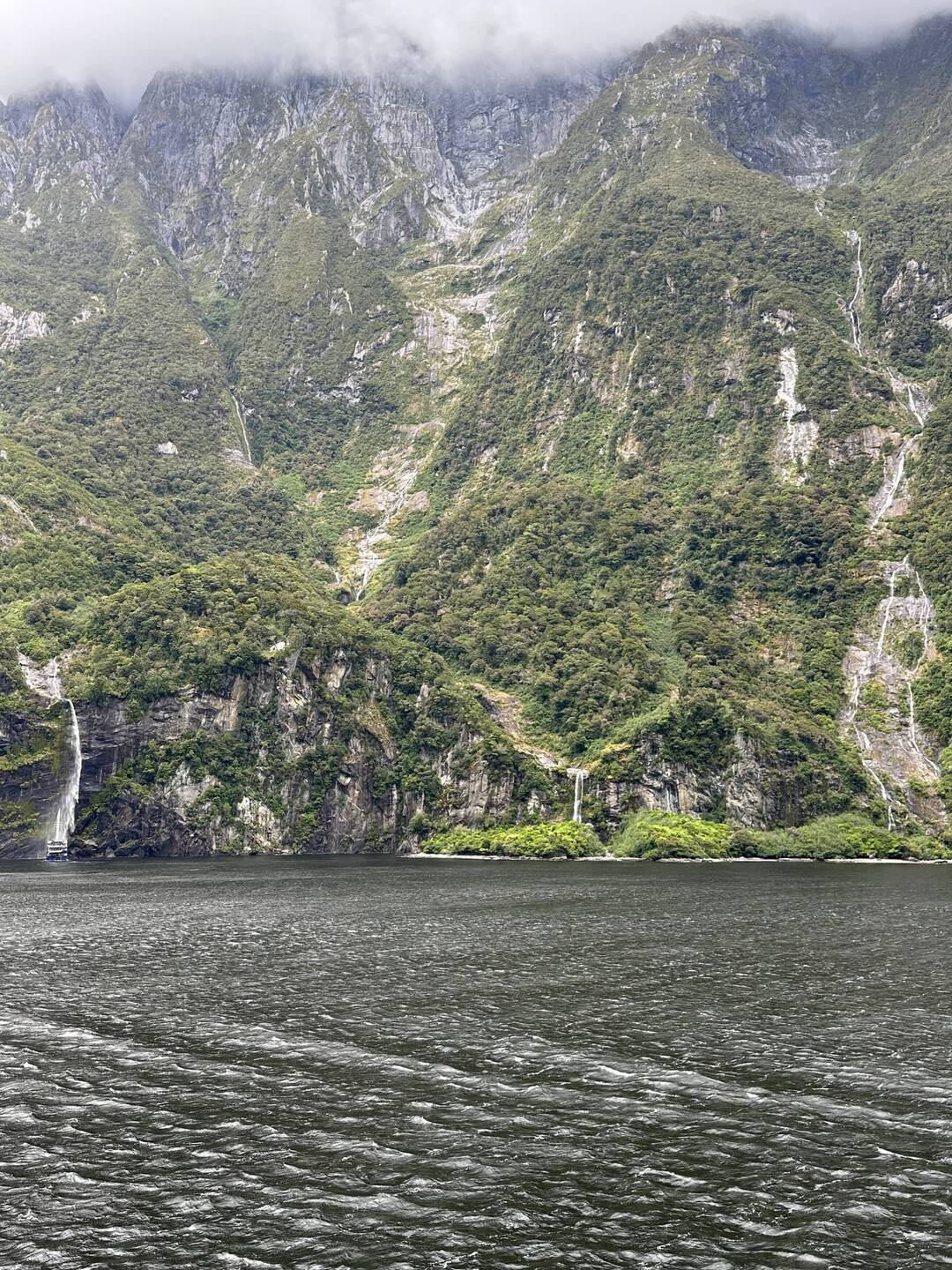 Check out the boat under the waterfall.