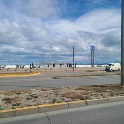 Coming into Puerto Arenas proper is the city sign.