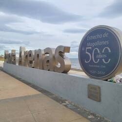 Same Puerto Arenas sign, but you can see the anniversary sign if Magellan.