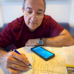 Mui working on plans for our RV Trip — Aboard Regatta.