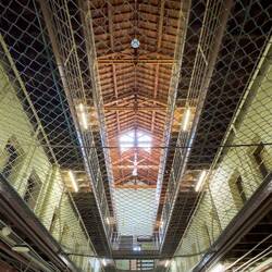 Looking up through the suicide net at Fremantle Prison.