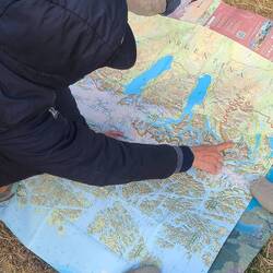 My boots serving as holding down the map.