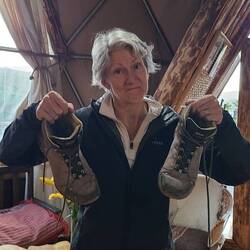 Turning in the boots. They've been on at least four continents.