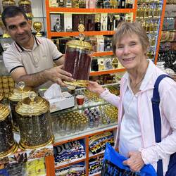 Souvenir bowls in bag, Hisbicus leaves in container.
