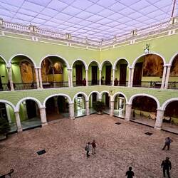 A government building with lots of paintings to see