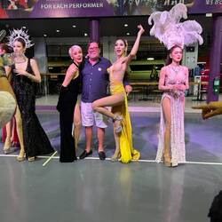 Posing for pictures with guests after the show.