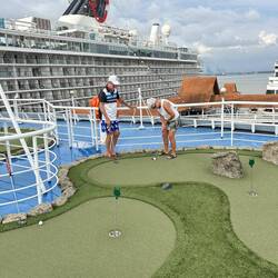 Relaxing, competitively, on the upper deck.