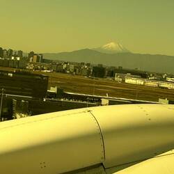Take off from Tokyo. Mount Fuji on horizon.