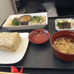 Hot dinner. Wrapped package is rice. Don't know about the other stuff!