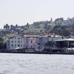 Expensive homes along the east bank of the strait