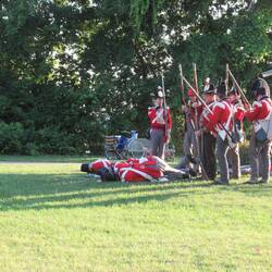 The British surrender in the end, with many troops lost.
