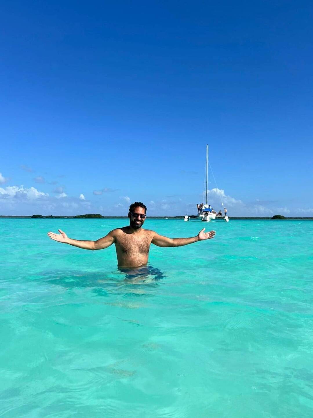 Me bathing in the incredibly turquoise waters of the Lagoon of Bacalar