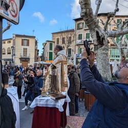 Priest blessing each of the pets
