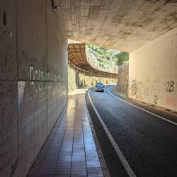 Walking back to town. The 'roof' is to protect people from falling rocks