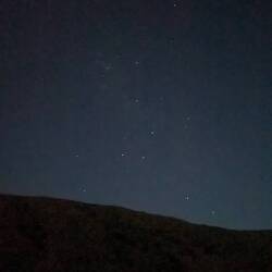 Southern Cross above the hills