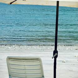 An umbrella and loung chair will cost $10 per person, plus an 18% service charge