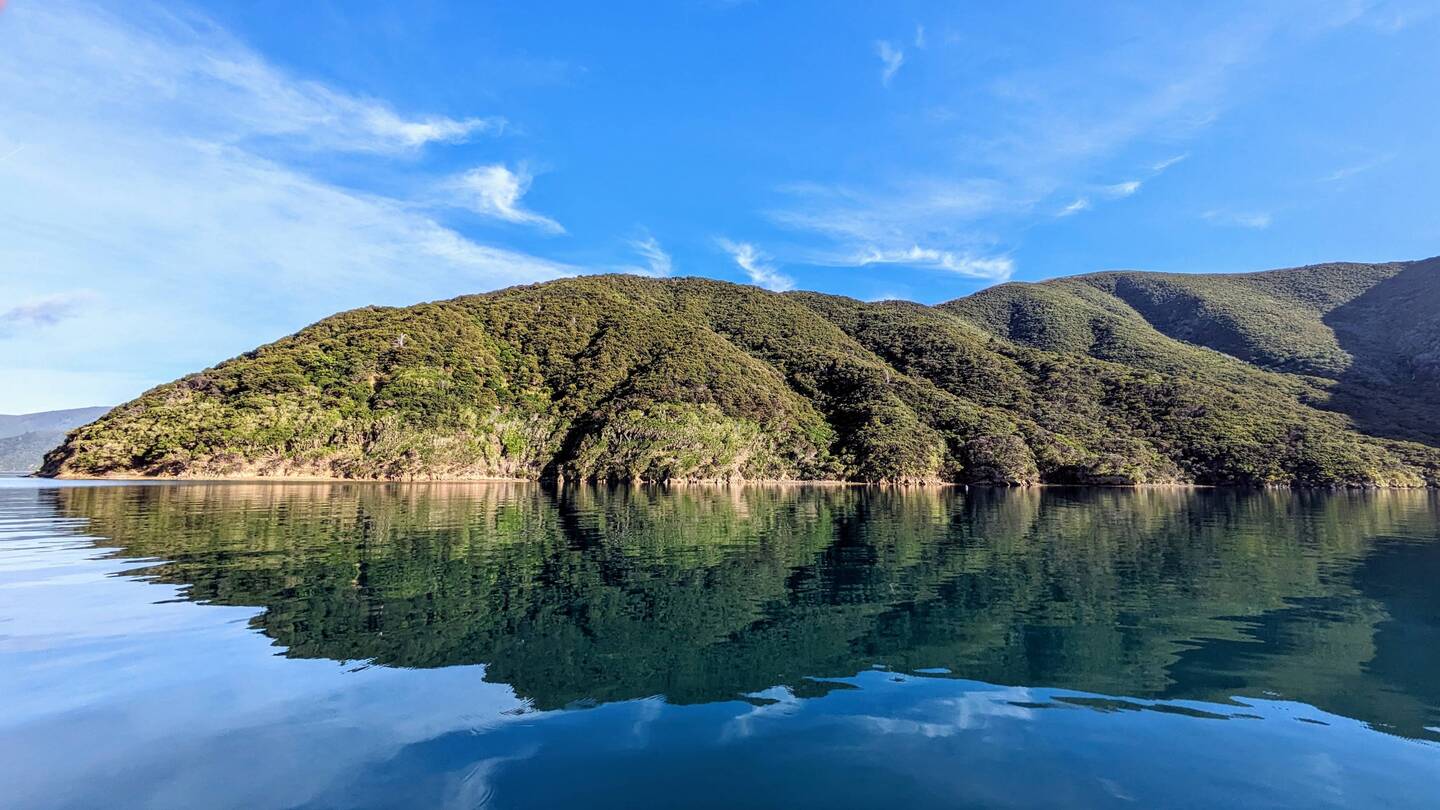 Glassy morning in Ketu Bay