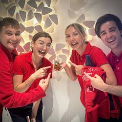 Neptune Entertainer's Joe, Emily, Lois, and Lewis all want Merle's autograph.