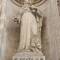 Saint Agata holding the tongs they used to torture her.