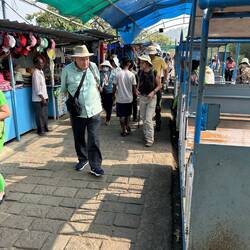 Walking through stalls on the way to the steps.