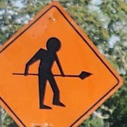 "Man with spear!" Was their construction zone sign