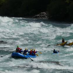 Security setup on Futaleufú: a raft is always accompanied by a safety kayakers and a kataraft