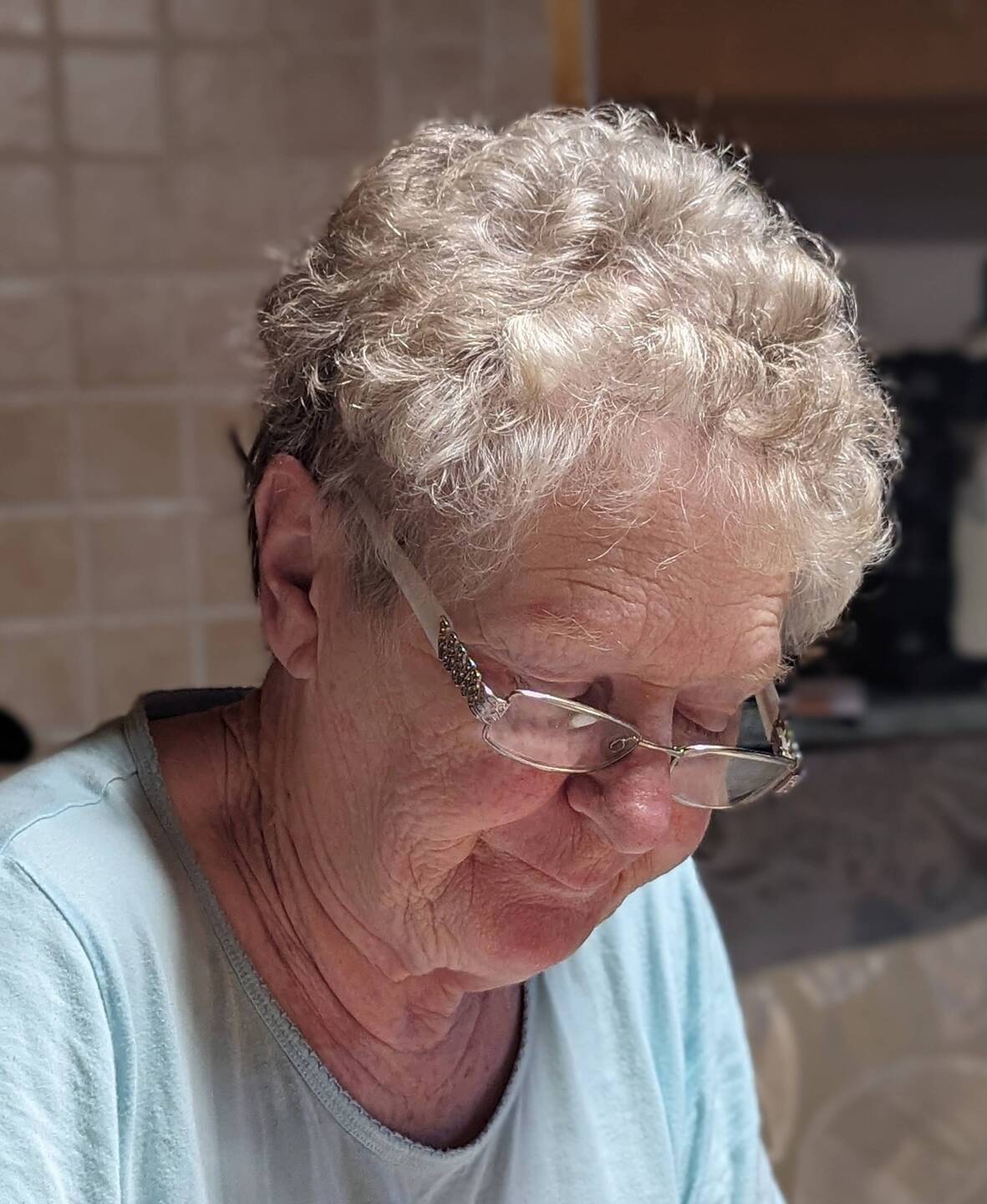 Mum opening the post and reading birthday cards