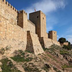 The lower wall and walkway is the barbican